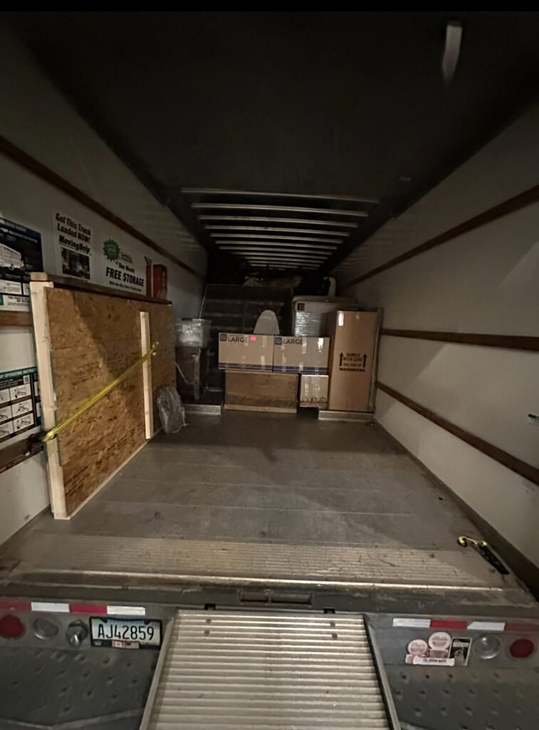 Merit and Muscle Moving fully loaded moving truck Tampa Bay movers